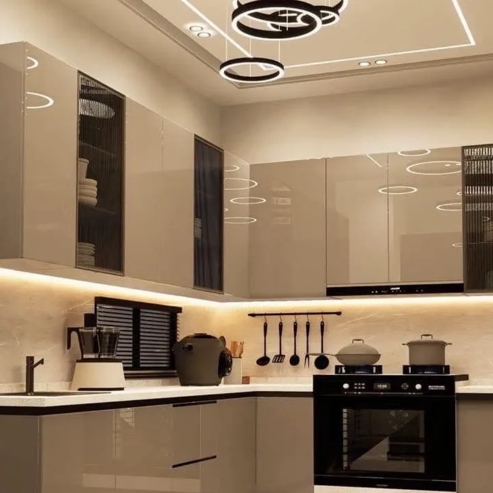 Modern kitchen interior design in UAE with custom cabinets and luxury finishing.